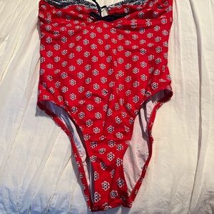 Super cute strapless one piece bathing suit. Red, white and blue.